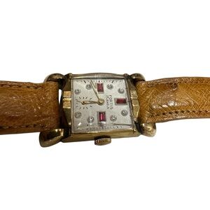 Vintage Fortis Gold and Brown Square Watch with diamonds and rubies. Alligator t